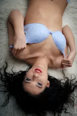 Adria Hudson Erotic Poses on White Rug Preview picture 4