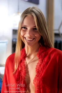 Luise Wixx in Scarlet Sheer and Seductive Stillness Video